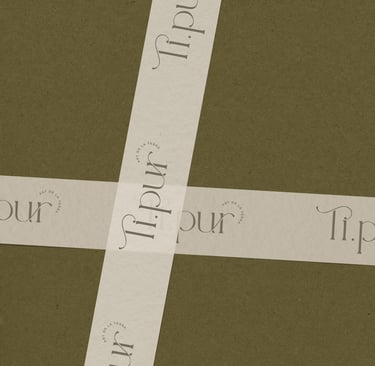a cross - cut out of a piece of paper with words on it