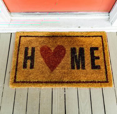 welcome mat that says home