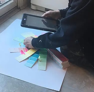marcine selecting colors for a bespoke mural in nj