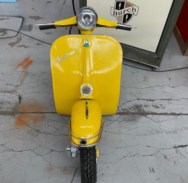 Front face of full-size vespa Yellow vintage wall decoration,vintage wall decor, old vintage,