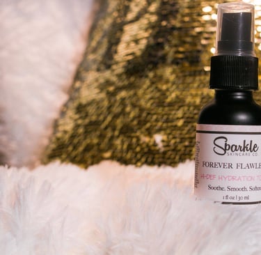 a bottle of Sparkle Skincare serum