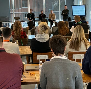 Company Q&A session about merging two corporate cultures, scrappy and sophisticated,.