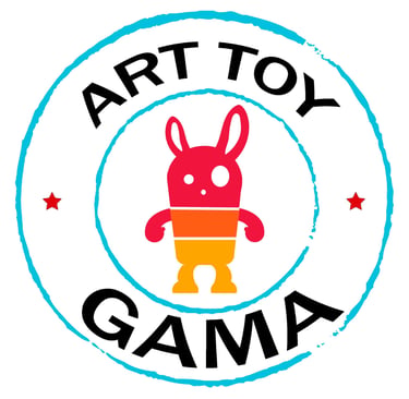 Art Toy Gama logo featuring a colorful gradient character inside a circular stamp with stars.