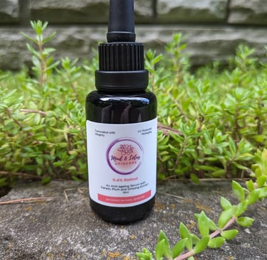 a bottle of retinol sitting near plants