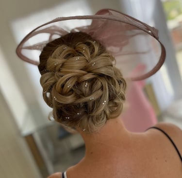 a women having her bridal hair done