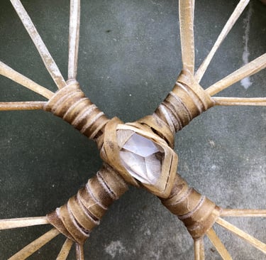 Shamanic drum birthing, buffalo with quartz crystal