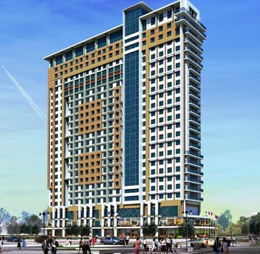 a tall building with a tall tower in the middle of it | High Life 2, Greater Noida West