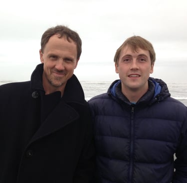 A beach photograph of Hank and Ian Smith of This Autistic Life.
