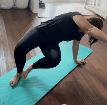 April Nicole attempting a Turkish Get-Up