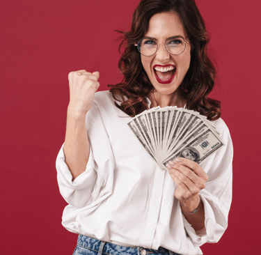 a woman with glasses and a white shirt holding a stack of money