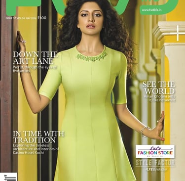 a woman in a yellow dress on the cover of a magazine