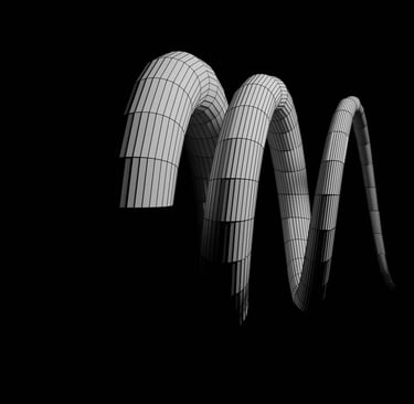 a group of three large white and black curved metal pipes