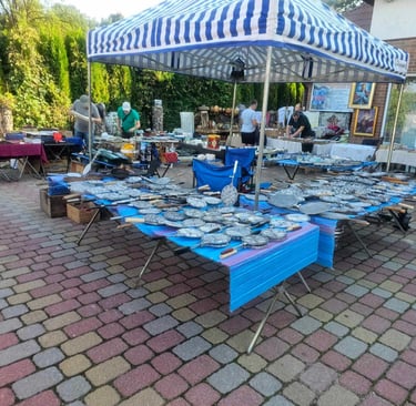 Sena Keptuvė Utenos miesto šventėje, Arvydo sendaikčių kieme