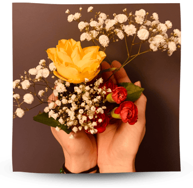 Martina holding flowers in her hands