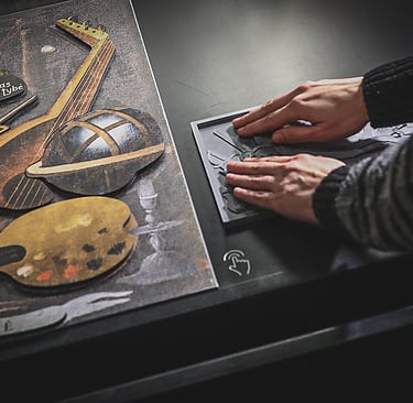 An interactive magnetic board and a raised image.