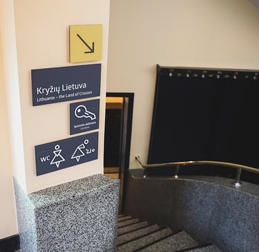 Museum signage and stairs marking.