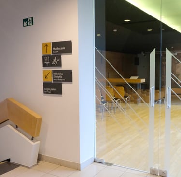 Signage example and the glass doors with doors stickers. 