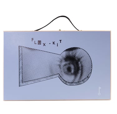 Blue FluxKit suitcase.