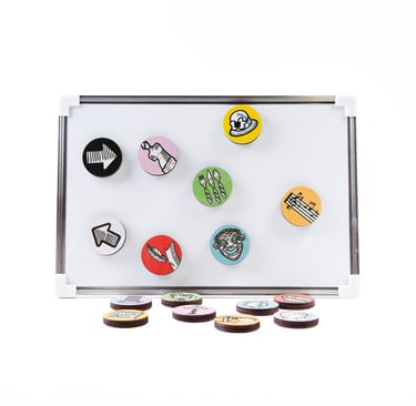 Magnetic board with colorful and tactile magnets