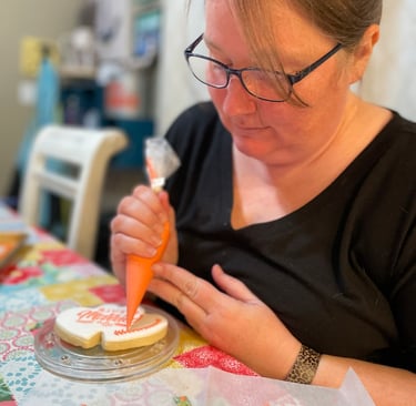 women decorating cookies