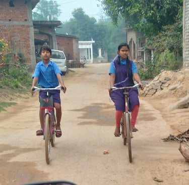 student riding cycle