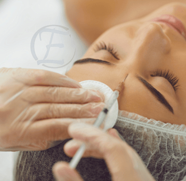 a woman getting a facial lift in a beauty salon