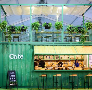 a green container container converted into a bar