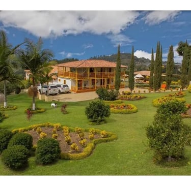 a large house with a car parked in front of it