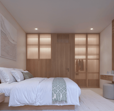 Bed view inside Villa Oraya, combining minimalist design with warm textures and calming Bali vibes