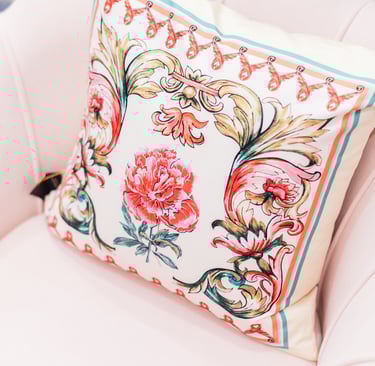 a chair with a pillow and a pillow at Kinntor