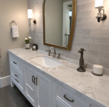 A round, white marble dish sits on a square, white marble slab with a smooth surface. Subtle gray veins and small specks are visible across the marble, enhancing its natural texture.