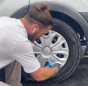 Jody cleaning a wheel