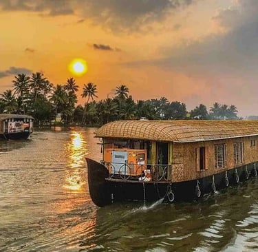 Houseboats on Alappuzha backwaters at sunset, a serene part of Kerala tours from Chennai.