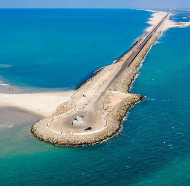 Scenic road and causeway over blue sea leading to Rameswaram, ideal for pilgrimage tours .