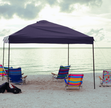 pop-up canopy providing shade at the beach