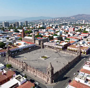 A vigilant security guard in uniform standing confidently outside a government building in Mexico.
