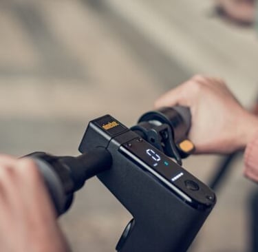 a person holding a camera and taking a picture