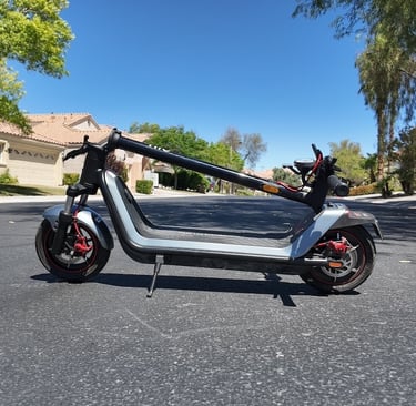 a scooter scooter parked on the street