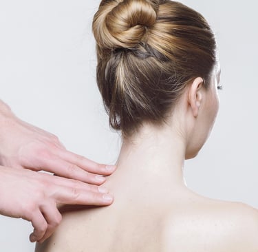 woman receives neck massage