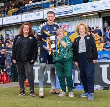 SSA Player of the Year 25/26 Liam Roberts receives his Trophy