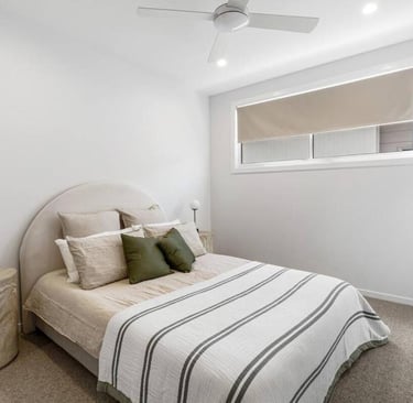 spacious master suite with queen size bed, ducted air conditioning and a ceiling fan with ensuite