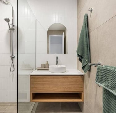 a bathroom with a sink and a shower at Arvia Villa Koala Park