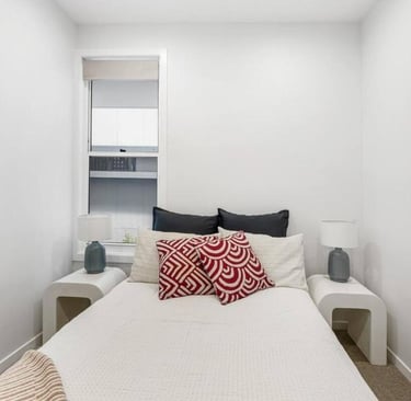 double bedroom with built in cupboards