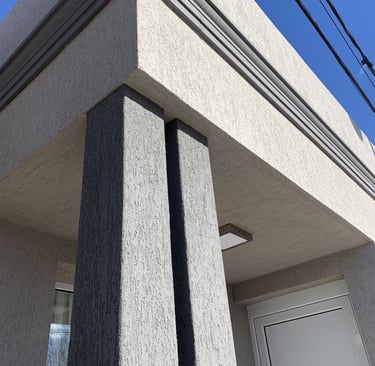 Casa con revestimiento texturado A llana