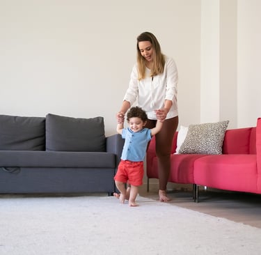 Mother and child enjoying a clean carpet in a bright living room in Melbourne, FL