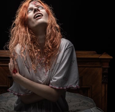 Possessed girl looking up representing the Possessed Edition of Trivia from the Grave