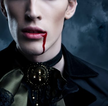 Vampire with blood dripping from mouth representing the Vampire Edition of Trivia from the Grave