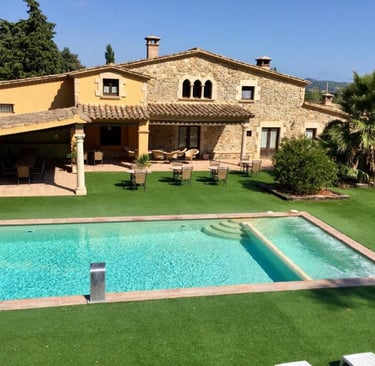 a Spanish villa with a swimming pool