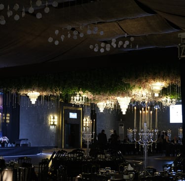 a large room with a lot of tables and chairs