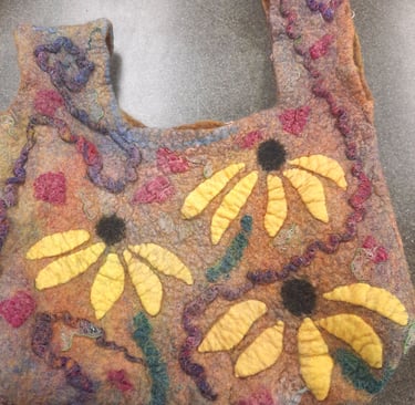 Handmade colorful wet felted wool bag with yellow floral sunflower designs and textured felt